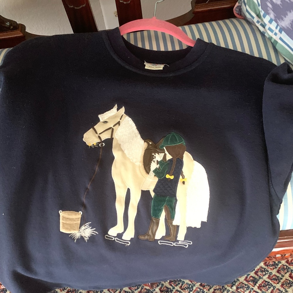 Beautiful navy kids sweater with horse back riding girl